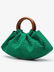 Elegant green pleated cloud bag with brown circular handles and textured fabric design