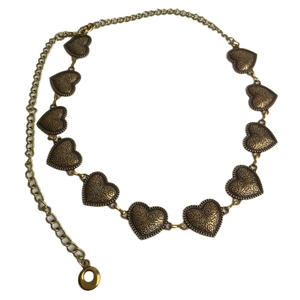 Vintage gold heart chain belt with intricate floral engravings and tassel detail