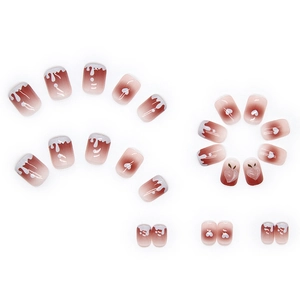 Cute peach press-on nail kit with 3D fruit accents and soft pink gradient finish