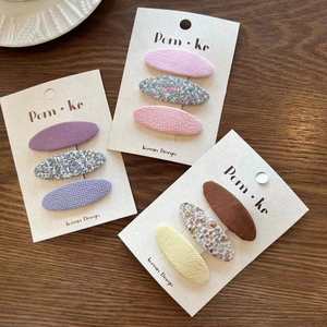 9-piece set of sweet floral and solid color fabric oval hair clips for girls