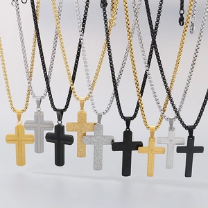 Stainless steel cross necklaces in gold, silver, and black with intricate engravings