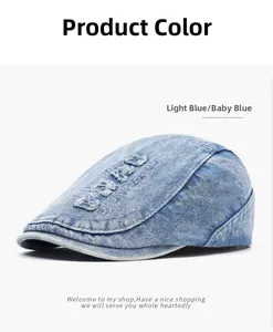 Detailed texture of baby blue washed denim ivy cap with vintage embroidered letters