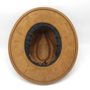Detail of brown wide brim fedora hat showing inner sweatband and adjustable drawstring