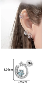Detail view of star-shaped micro-inset zircon earrings with sizing measurements