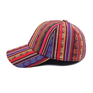 Close-up of bohemian baseball cap with ethnic colorful woven stripes and patterns