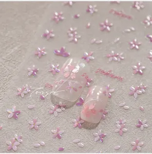 Detailed relief Sakura nail art stickers with pink gradient and holographic effect