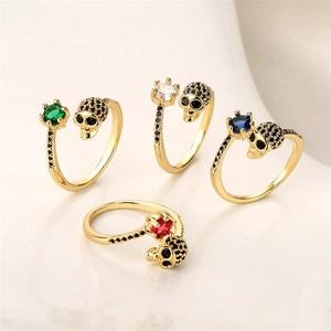 Colorful zircon skull open ring in gold finish featuring green blue and red stones