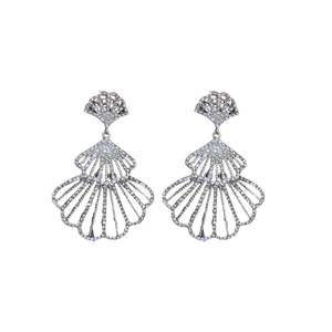 Elegant silver fan-shaped drop earrings with shimmering crystals on a white background