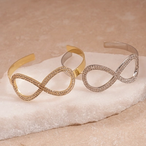 Elegante bracciale rigido aperto infinito con cristalli pavé in finitura oro e argento
