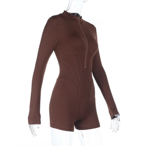 Detail view of brown corset-style jumpsuit showing slim fit bodice and zipper closure