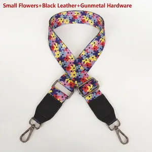 Floral crossbody strap with colorful flower pattern, black leather ends and gold hooks