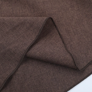 Close-up of coffee brown long sleeve dress fabric showing detailed knit texture and hem stitching
