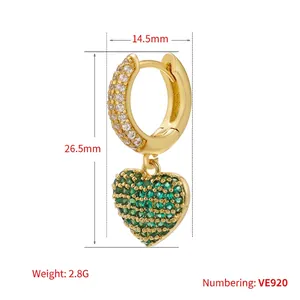 Luxurious gold heart hoop earrings with micro-paved green stones and sparkling diamonds