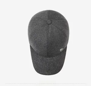 Overhead view showing the six-panel structure and metal badge of the winter baseball cap