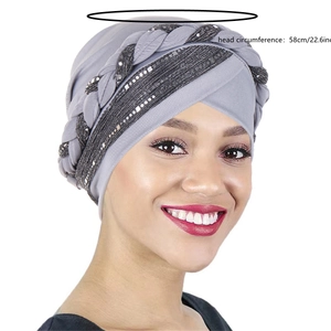 Detail view of grey sequined turban hat for women showing 58cm head circumference size