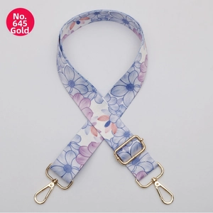 Detail of adjustable 38mm wide floral bag strap No. 645 with gold metal hooks