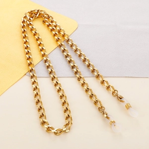 Detail of golden metal link chain with transparent silicone anti-slip loop connectors