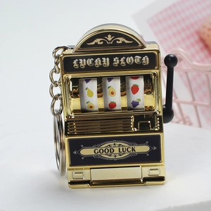 Mini golden fruit slot machine keychain with pull lever and lucky sloth engraving