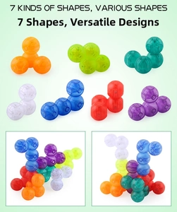 Detail of seven transparent magnetic blocks showing various building shapes and colors