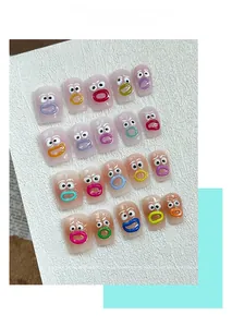 Close-up of 3D cartoon graffiti nail stickers with cute funny mouth and eye charms