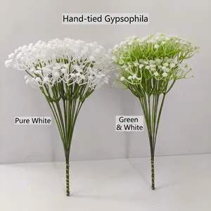Artificial white and green gypsophila bouquets with elegant golden thread wrapping