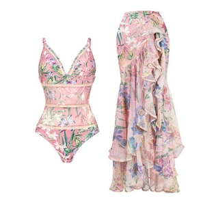 Pink floral one-piece swimsuit and ruffled mesh skirt set for women with tropical print