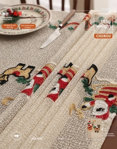 Close-up of Santa and reindeer embroidery on high-density 185g Christmas tablecloth