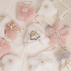 Christmas plush tree ornaments featuring stars and stockings in soft pink and white tones