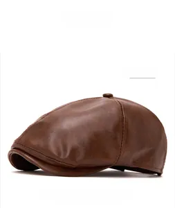 Detailed view of dark brown PU leather beret with six-panel stitching and top button