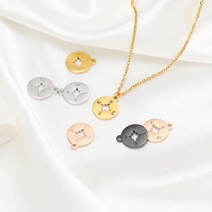 Compass star pendant necklaces in gold, silver, rose gold and black on silk background