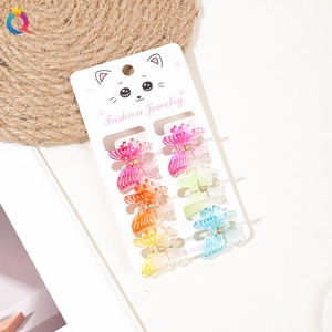 Set of 6 colorful gradient butterfly hair clips on a white display card packaging