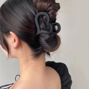 Black matte heart-shaped shark hair claw clip for women's elegant updo hairstyles