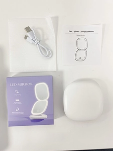 Detail of LED makeup mirror set with USB cable, manual and packaging box