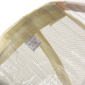 Detail view of the baseball cap's inner mesh fabric and 35% polyester material label