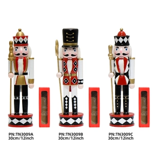Three 12-inch diamond-patterned wooden nutcracker kings in red boxes for Christmas decor