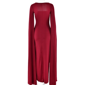 Detail of the elegant floor-length cape sleeves on a dark red square neck evening gown