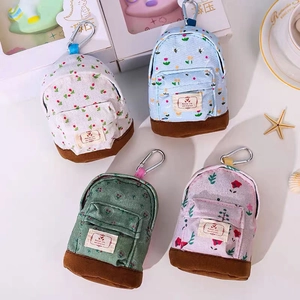 Mini floral canvas coin purses in four colors with hiking buckles and cute backpack design