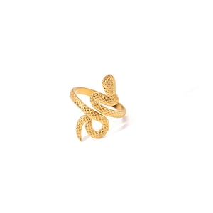 Detail of a golden adjustable snake ring made of titanium steel with scale texture