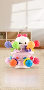 Close-up of colorful baby Manhattan rattle ball with textured silicone teething tubes