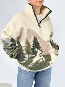 Half-zip cream fleece sweatshirt featuring a snowy mountain and forest print for winter