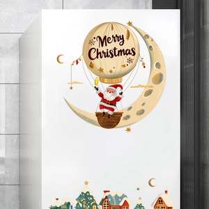 Festive Christmas wall stickers featuring Santa, moon, and balloons on a smooth white surface