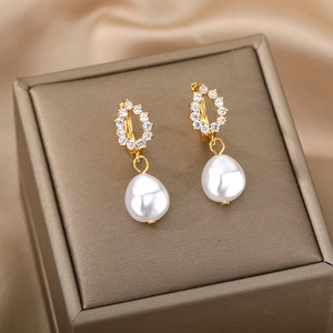 Elegant gold freshwater pearl earrings with zircon inlay on luxury gift box