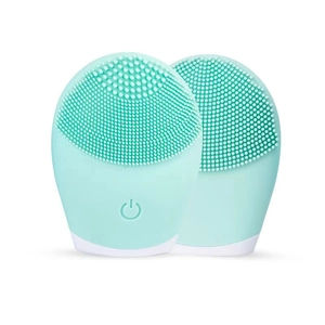 Detail view of mint green silicone facial cleanser brushes with soft bristles and power button