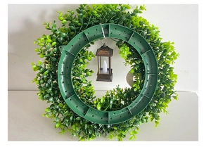 Rear view of eucalyptus Christmas wreath showing the back frame and LED lantern structure