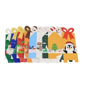 Colorful Christmas candy boxes with butterfly-shaped handles and festive holiday patterns