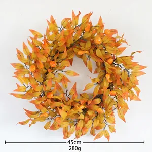 Detail of 45cm autumn wreath with sunflowers, pumpkins and berries on white background