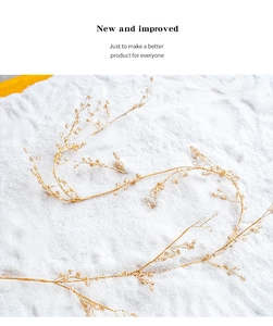 Detailed view of elegant golden crystal bead headband with botanical branch design style