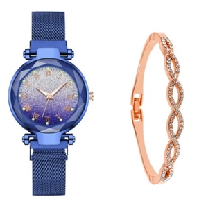 Detail of blue starry sky dial watch with Roman numerals and matching gold bracelet
