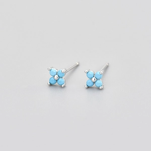 Blue zircon flower stud earrings in 925 sterling silver with a four-leaf clover design