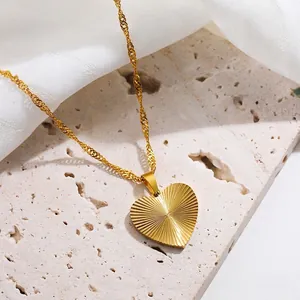 18K gold plated heart necklace with sunburst texture pendant on twisted chain